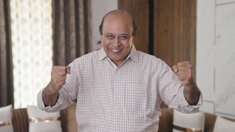 Old-Indian-uncle-cheering-and-celebrating