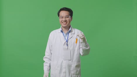 scientist holding test tube