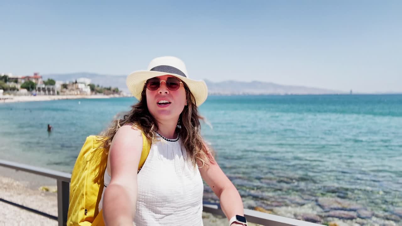 Contemplating the Aegean: Woman Enjoys Coastal View