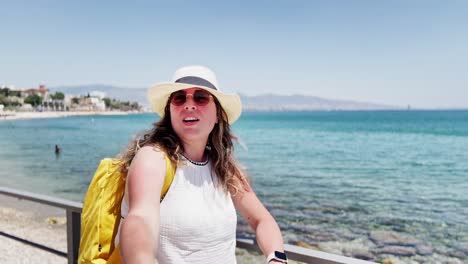 contemplating the aegean: woman enjoys coastal view