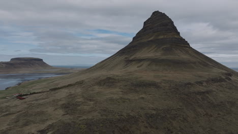 kirkjufell's enigmatic elevation: aerial exploration of iceland's majestic mountain