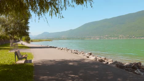 empty beach park on shore of lake bourget in aix-les-bains, savoie, france