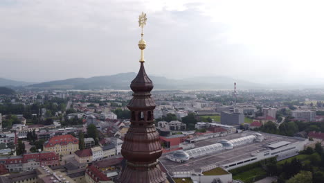 close up aerial circling around the spine of klagenfurt parish church