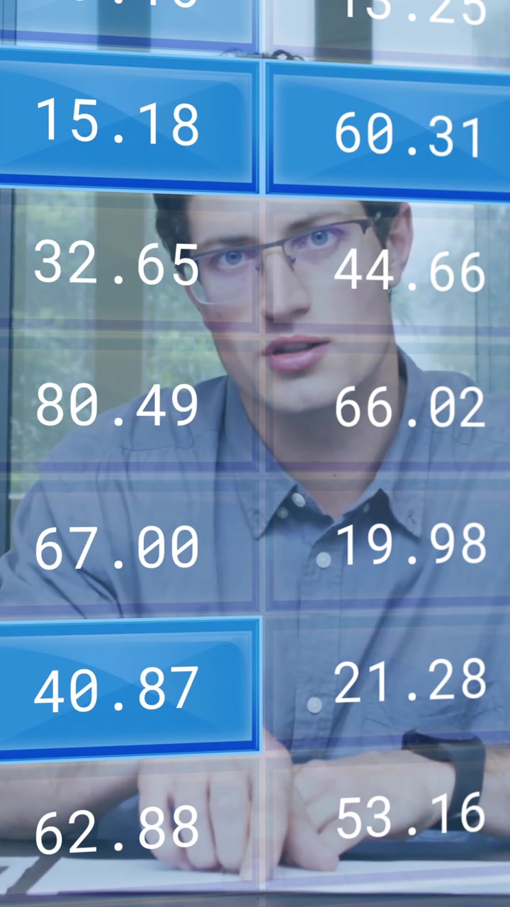 Animation of stock market over caucasian businessman having video call