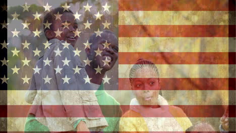Afroamerikanische-Familie-Verbringt-Zeit-Miteinander-Vor-Amerikanischer-Flagge
