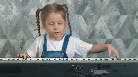 portrait of little girl at home in quarantine