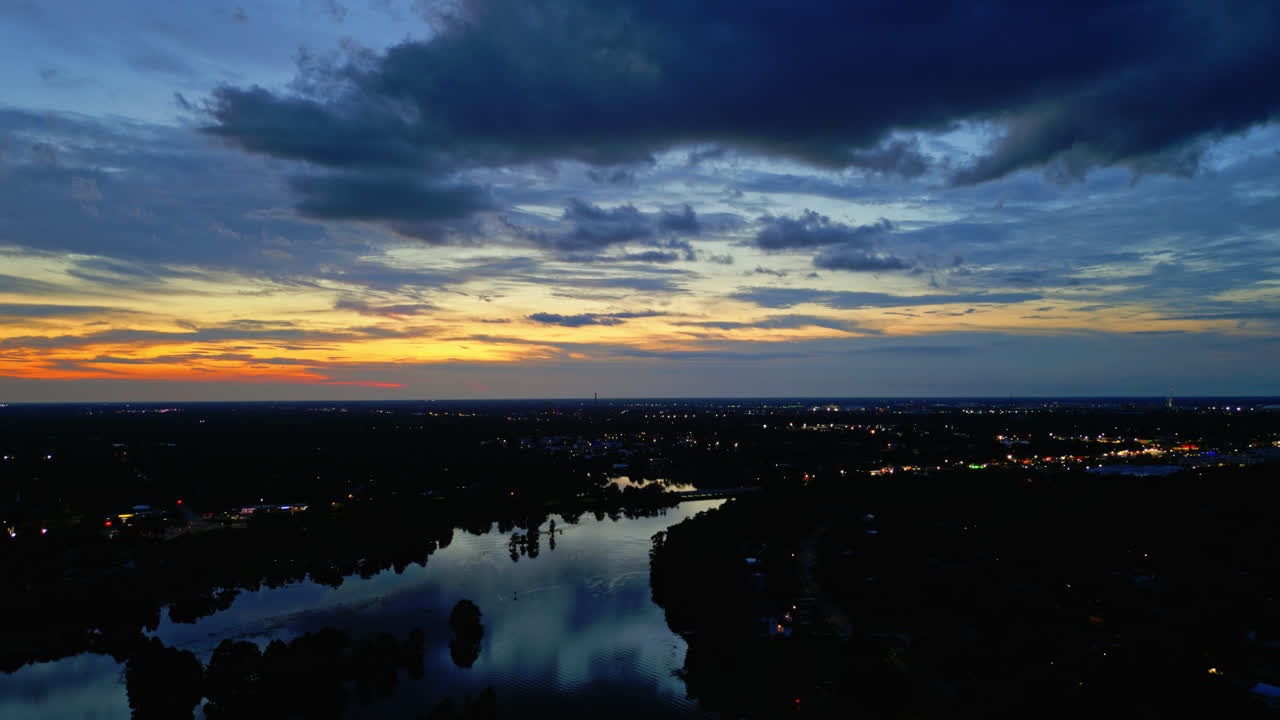 A Beautiful and Tranquil Scene Of the Evening Twilight Sky Over a River In Tampa City, Florida - Drone Shot Tracking to the Left