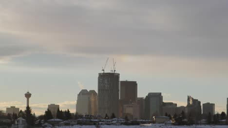 the downtown calgary skyline seen from the east side looking west at sunset on january 18, 2011