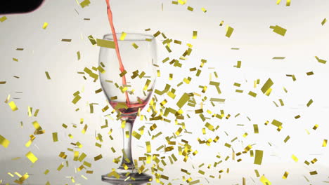 animation of confetti over rose wine pouring into glass on white background