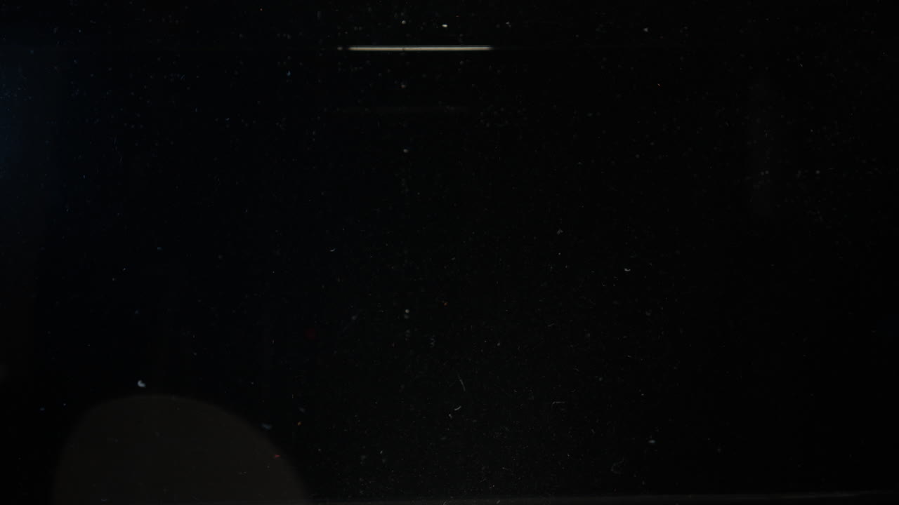 Lemon slices and strawberries fruit falling into water slow motion background