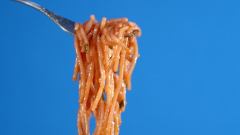 fork with boiled spaghetti pasta.