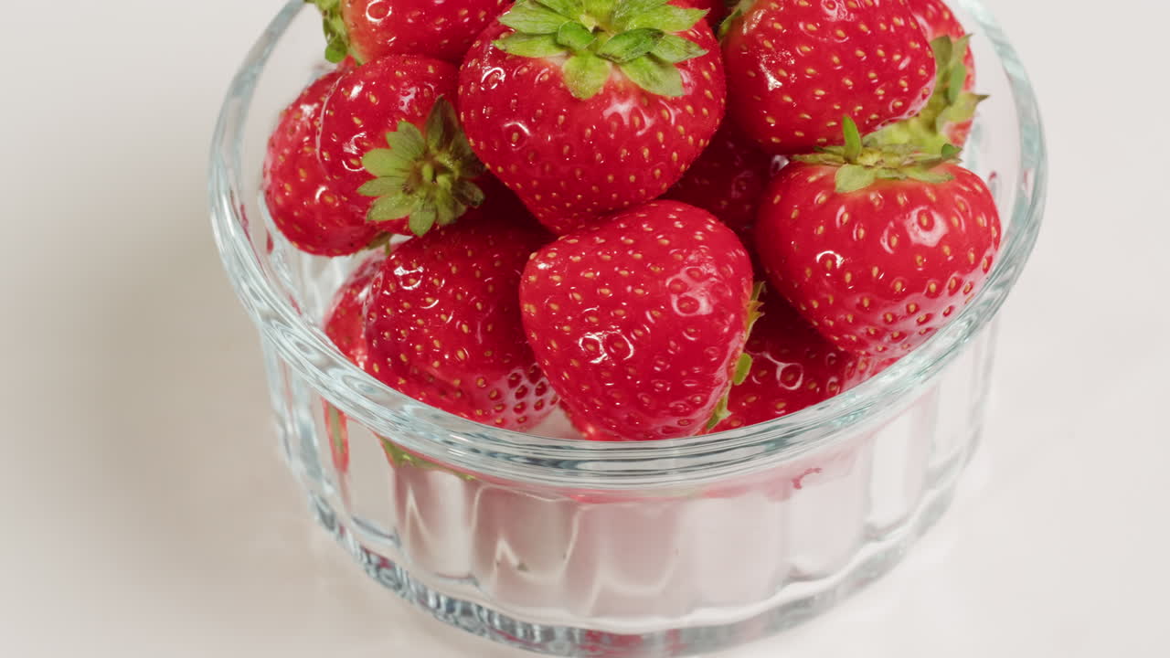 Fresh Red Strawberries in a Glass Bowl