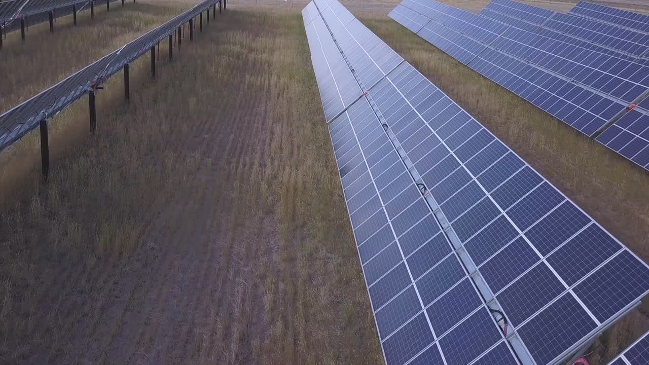 Premium stock video - Huge array of solar panels aligned on clean ...