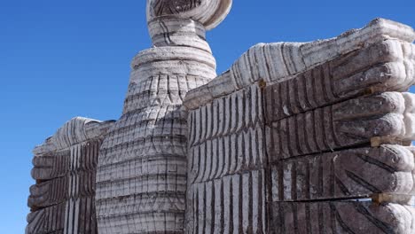 tilt down condor sculpture made of salt on uyuni salt flat in bolivia