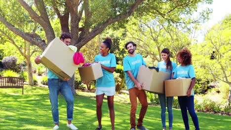 group of volunteer holding cartons