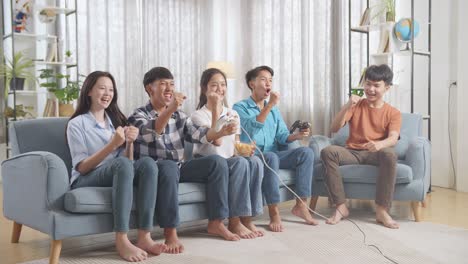 friends playing video games at home