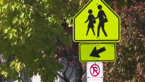 PEOPLE-CROSSING-XING-YELLOW-SIGN