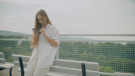 positive woman browsing social media