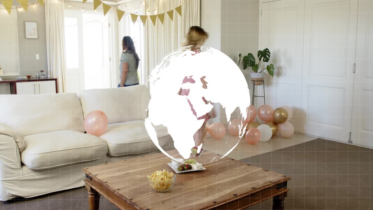 Two women entering room with balloons preparing party globe rotating then clearing revealing setup