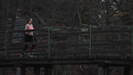 overweight young woman jogging in the street