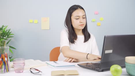 female student looking at camera with positive and positive gesture.