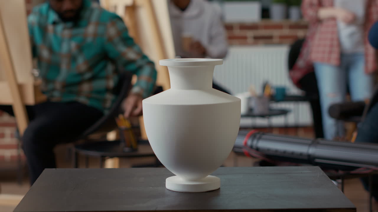 Vase model on table in front of art students to draw on canvas