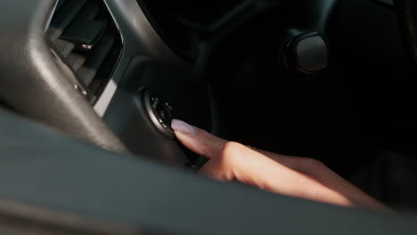 woman adjusting rear mirror