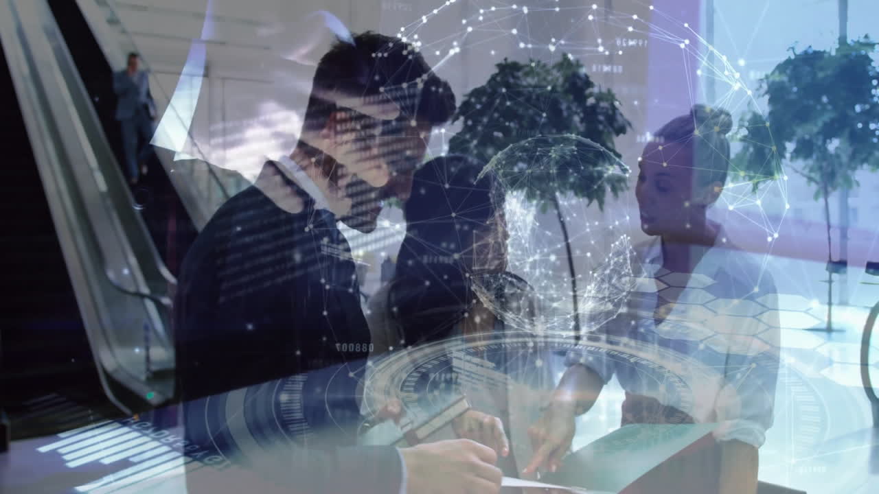 Collaborating, business professionals using digital data with network connections overlay