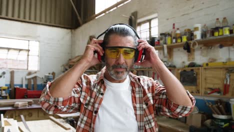 carpenter putting his equipment