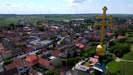 cross atop church tower overlooking town of poysdorf in lower austria, austria