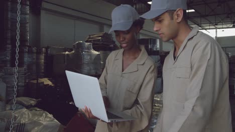 Young-warehouse-workers-interacting