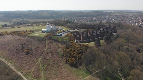 Old-lighthouse-surrounding-a-golf-course-in-Cromer,-England,-United-Kingdom