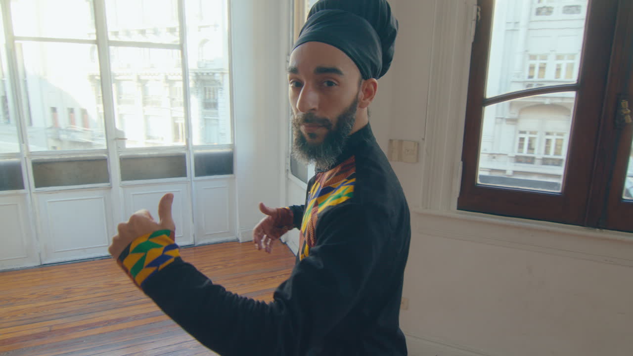 Male Dancer in Stage Costume Dancing Tango and Posing on Camera in Studio