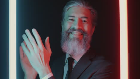 Smiling Business Man in Neon Lighting
