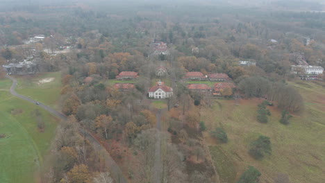 High-aerial-of-small-rural-town-only-accessible-by-small-road