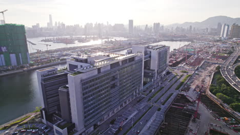 aerial drone shot over hong kong children's hospital is a children's hospital and future new acute hospital at kai tak development area, june 2022