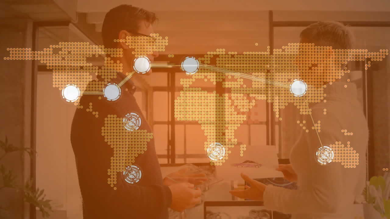 Two professionals reviewing business data on tablet in office with animated network nodes overlay