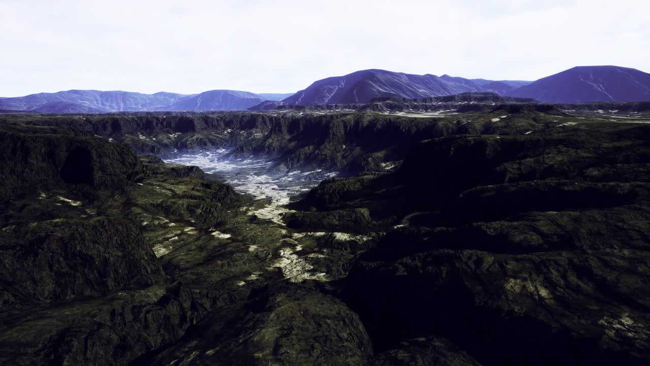 Canyons reveal breathtaking mountain beauty beneath a clear sky