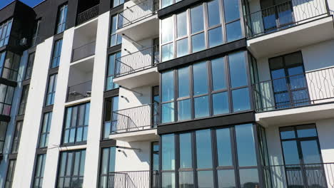 newly built modern apartment building facade. exterior of multi storey building. modern design of urban architecture. aerial view.