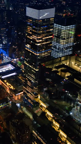 shining luminous new york at night time. breathtaking cityscape of never sleeping metropolis from aerial perspective.