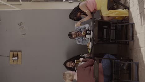 Friends enjoy drinks and socialize at a bar or restaurant