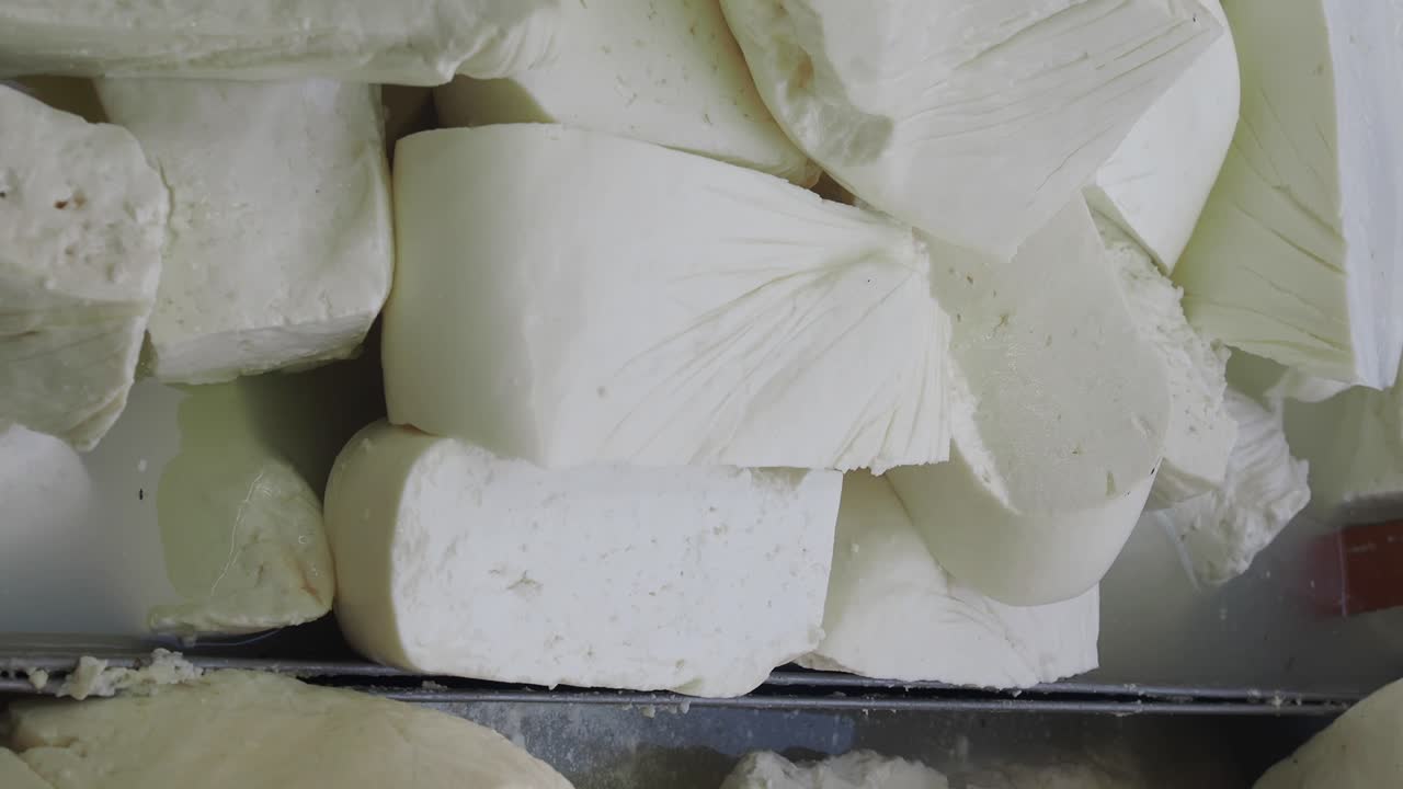 Close up of white cheese pieces