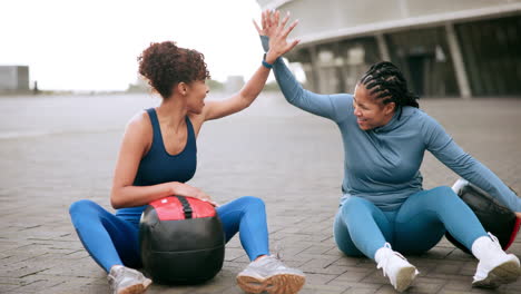 two women working out outdoors