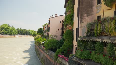 riverside houses and restaurants in verona, italy