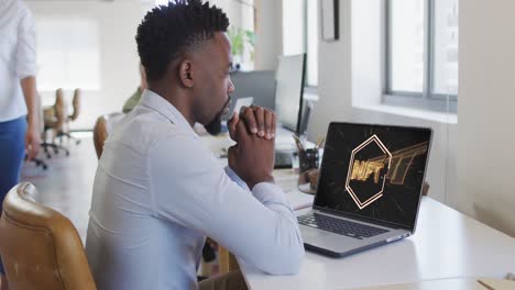 african american businessman using laptop for video call with nft text