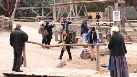 family exploring sovereign hill, interacting with exhibits