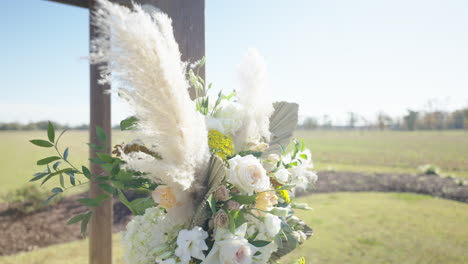beautiful bouquet of flowers at scenic outdoor wedding venue