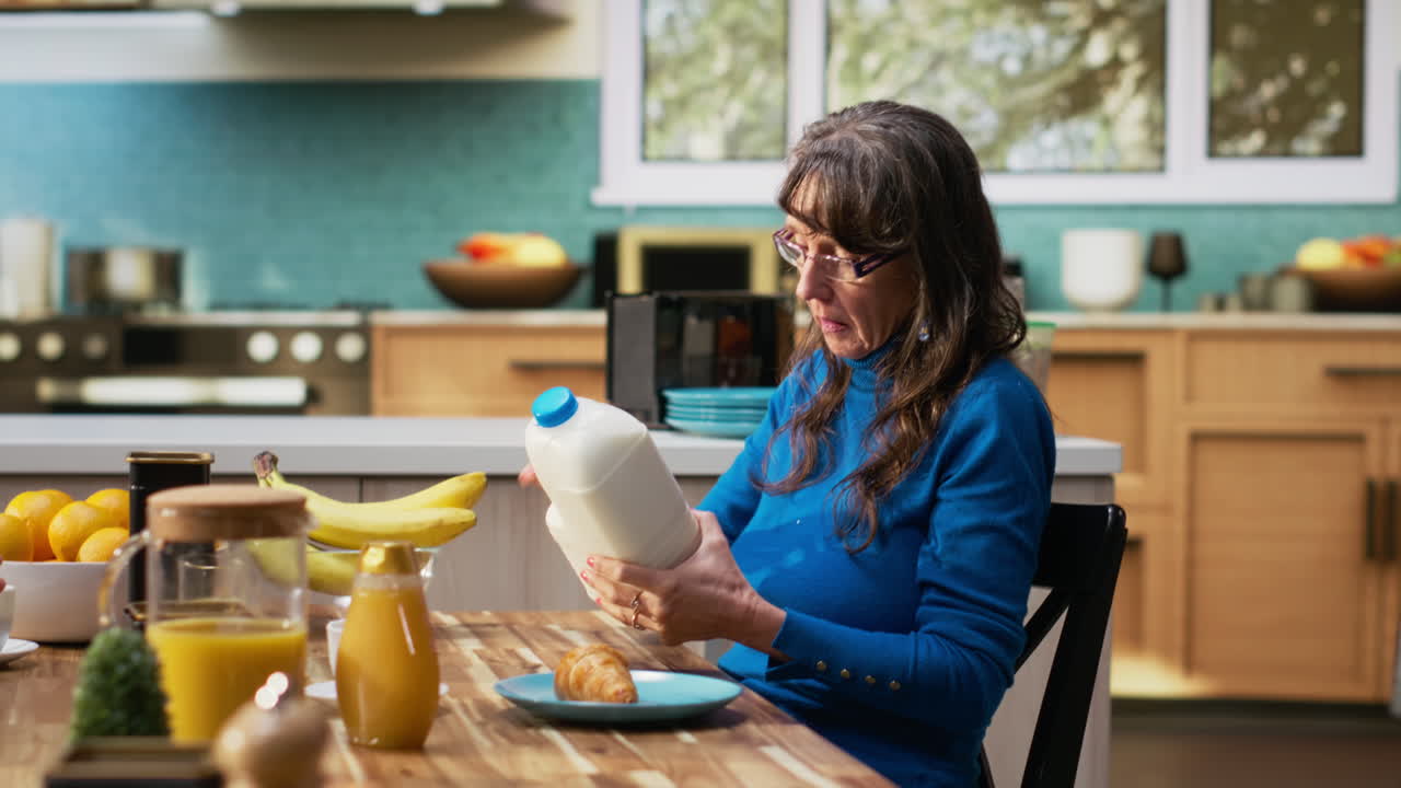 Old man and woman reading ingredients on organic product label
