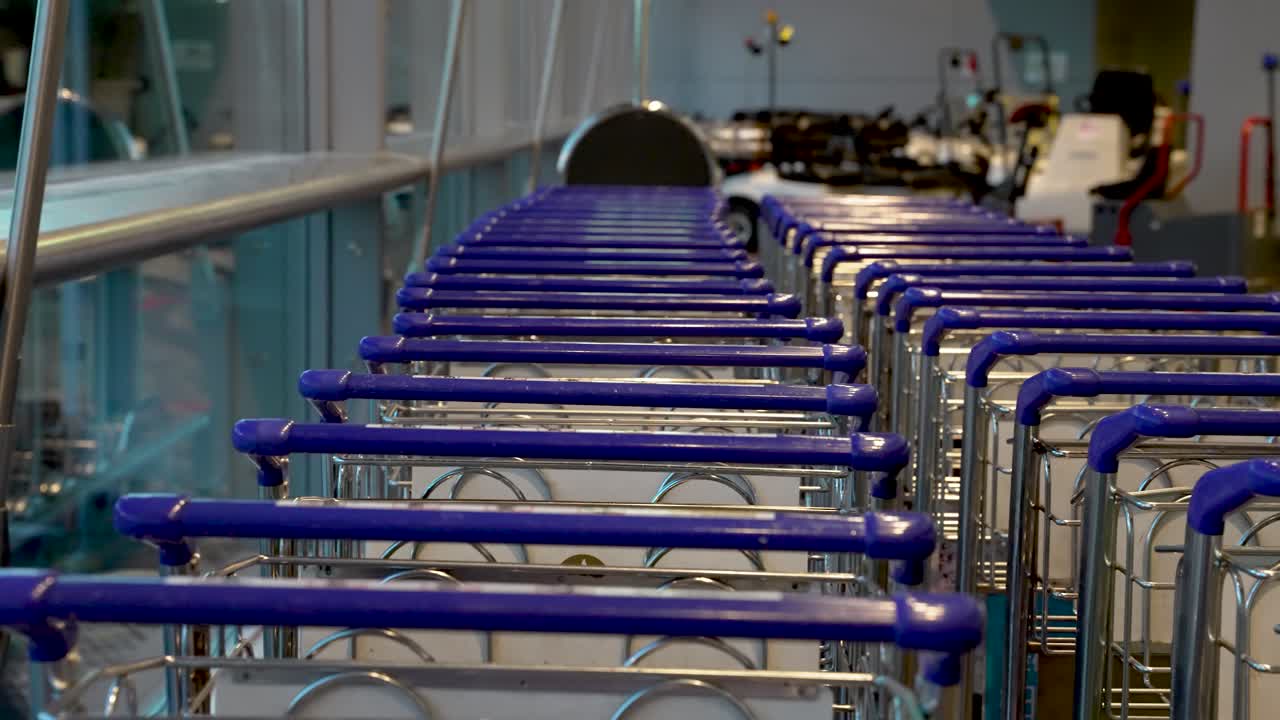 Airport trolley luggage carts, designed to effortlessly transport luggage, providing a convenient solution for passengers to manage their belongings
