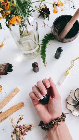 spiritual healing session with crystals and herbs